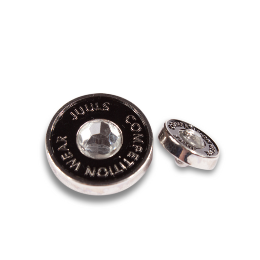 One large button and one small sleeve button in black that come with the JuulC Buttonset Strass with Crystal stone in the middle