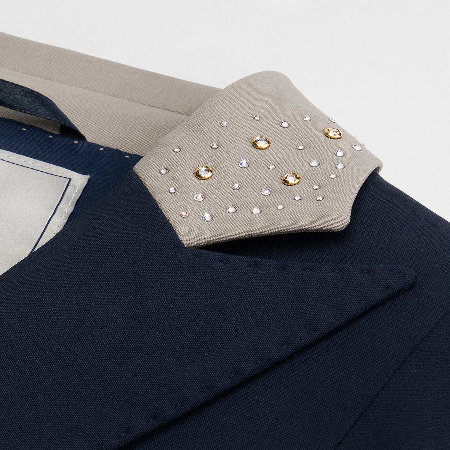 Detail of the beige collar of JuulC Women's Dressage Frack in Navy Taupe with Swarovski crystals